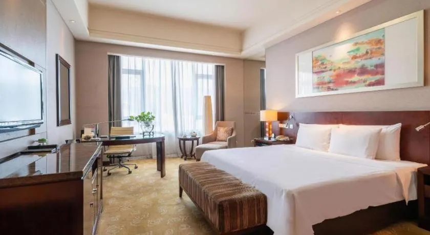 Bed in Quanzhou Guest House Hotel