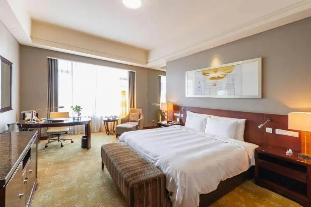 Bed in Quanzhou Guest House Hotel