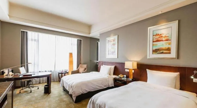 Bed in Quanzhou Guest House Hotel