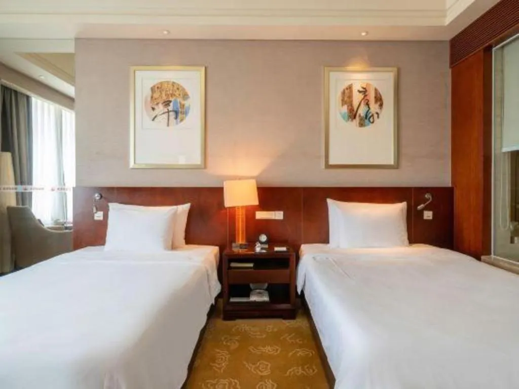 Bed in Quanzhou Guest House Hotel