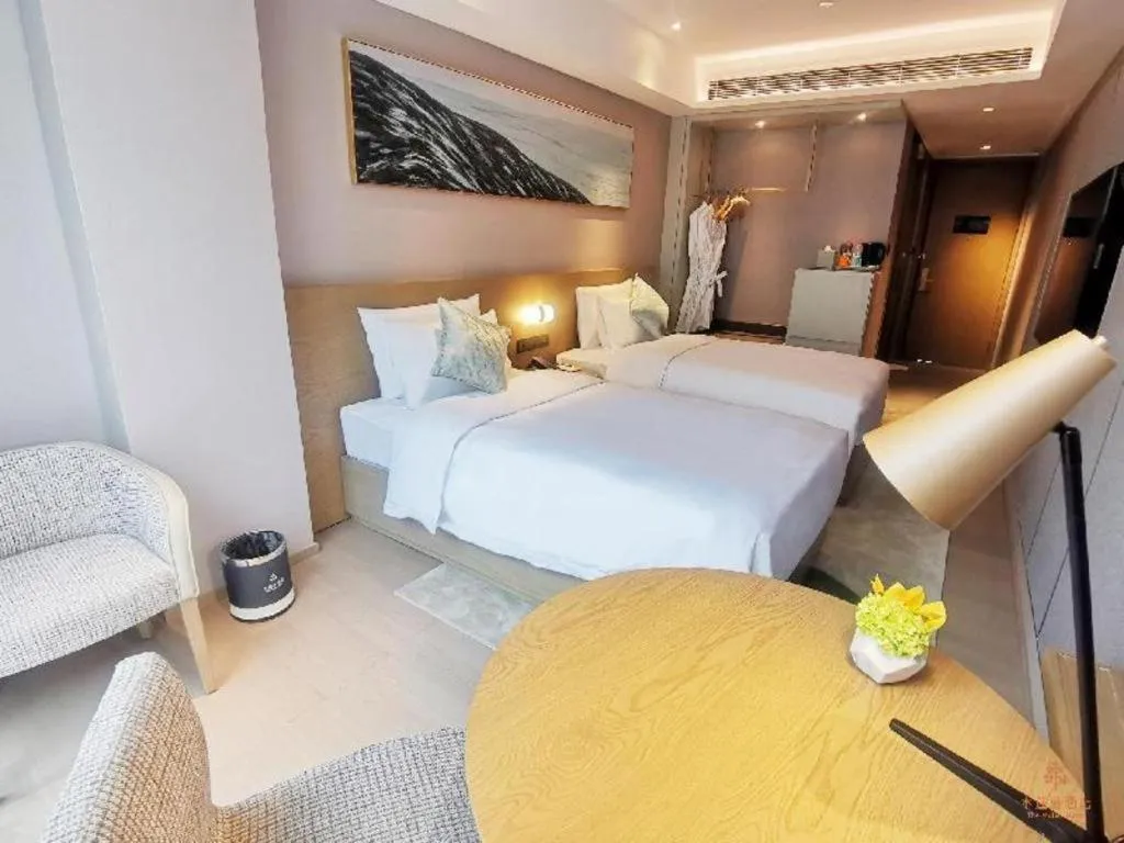 Bed in Kecheng Holiday Hotel