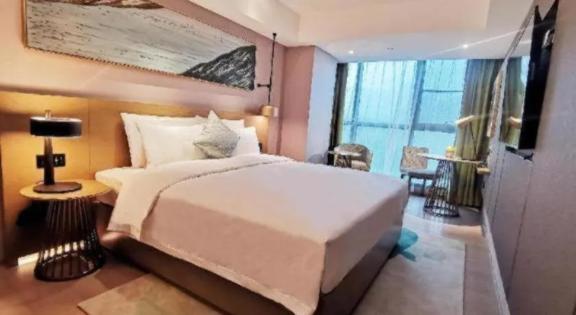 Bed in Kecheng Holiday Hotel