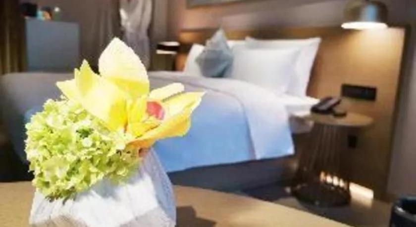 Bed in Kecheng Holiday Hotel