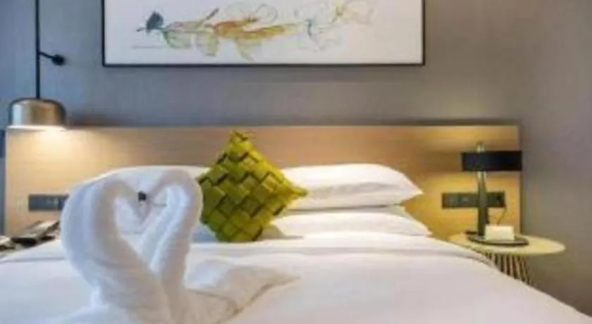 Bed in Kecheng Holiday Hotel