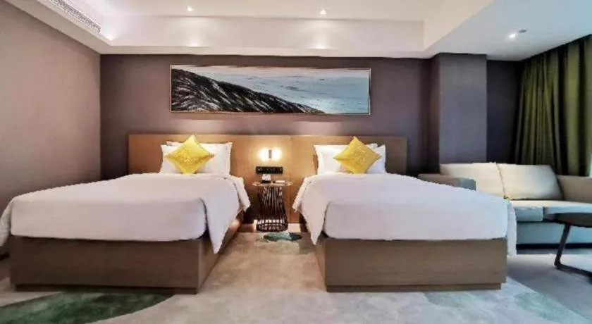 Bed in Kecheng Holiday Hotel