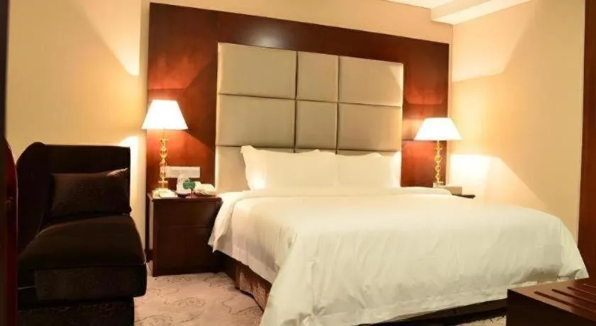 Bed in Kecheng Holiday Hotel