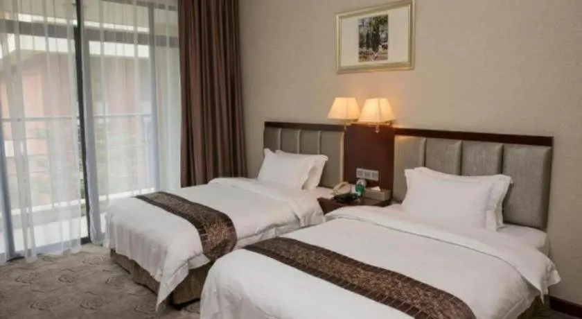 Bed in Kecheng Holiday Hotel