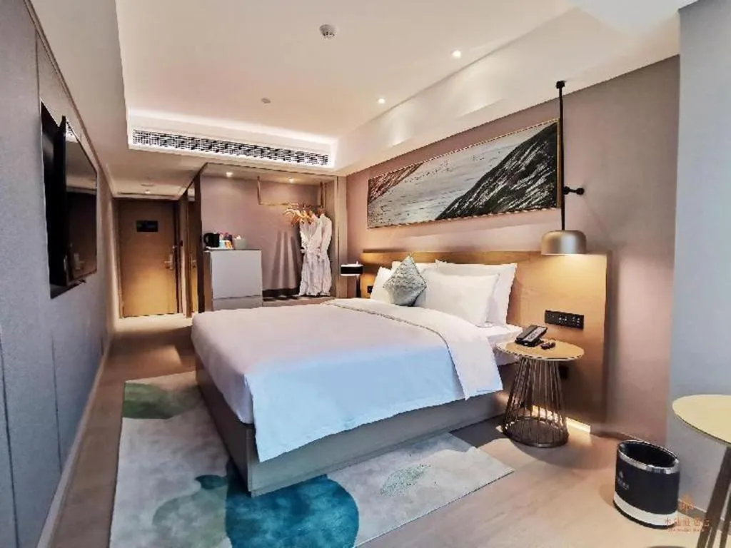 Bed in Kecheng Holiday Hotel