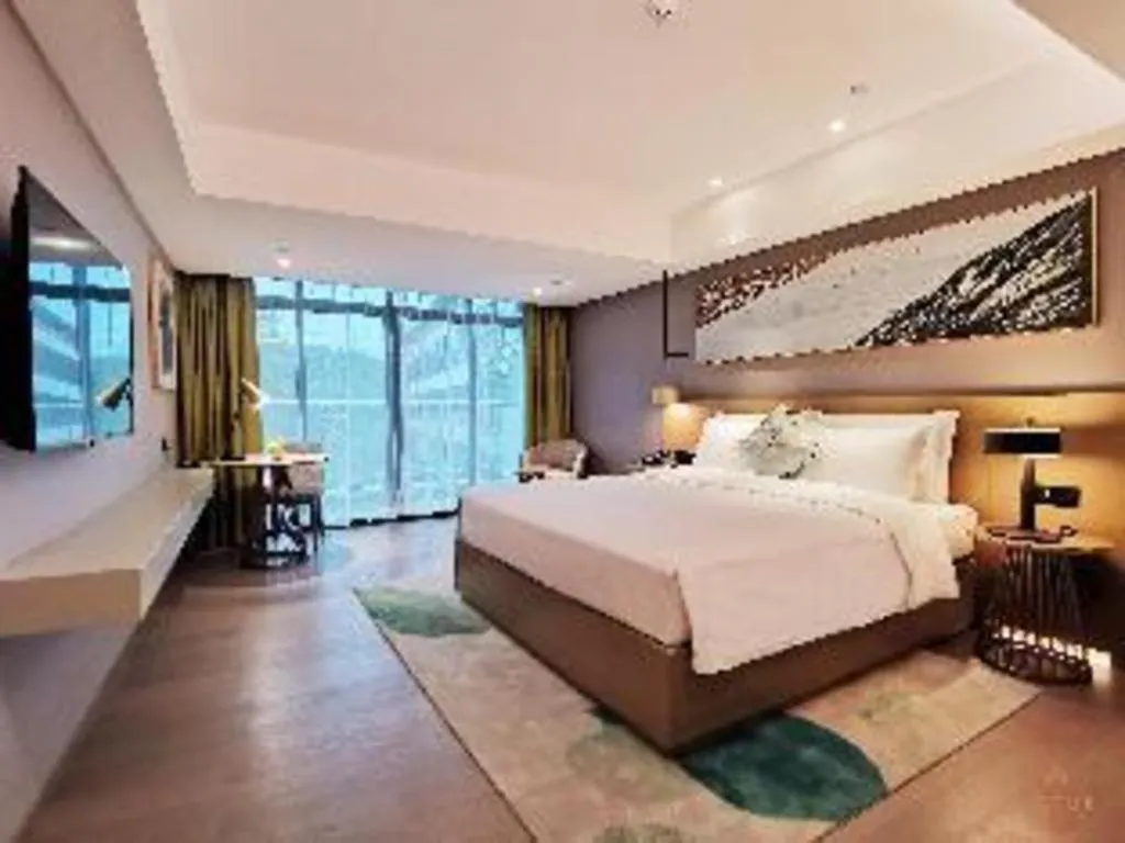 Bed in Kecheng Holiday Hotel