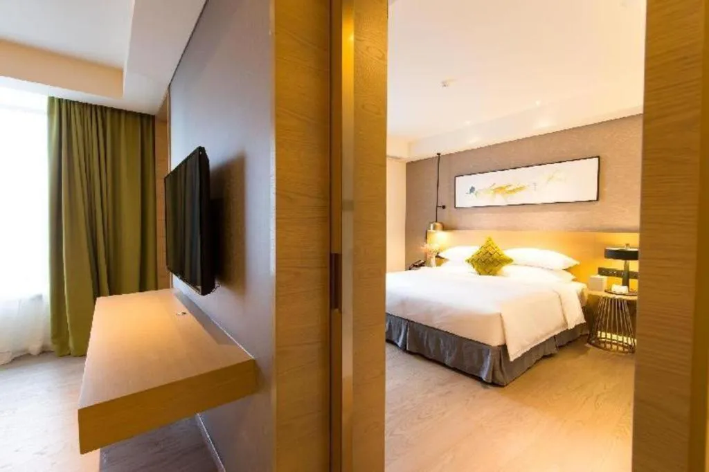 Bed in Kecheng Holiday Hotel