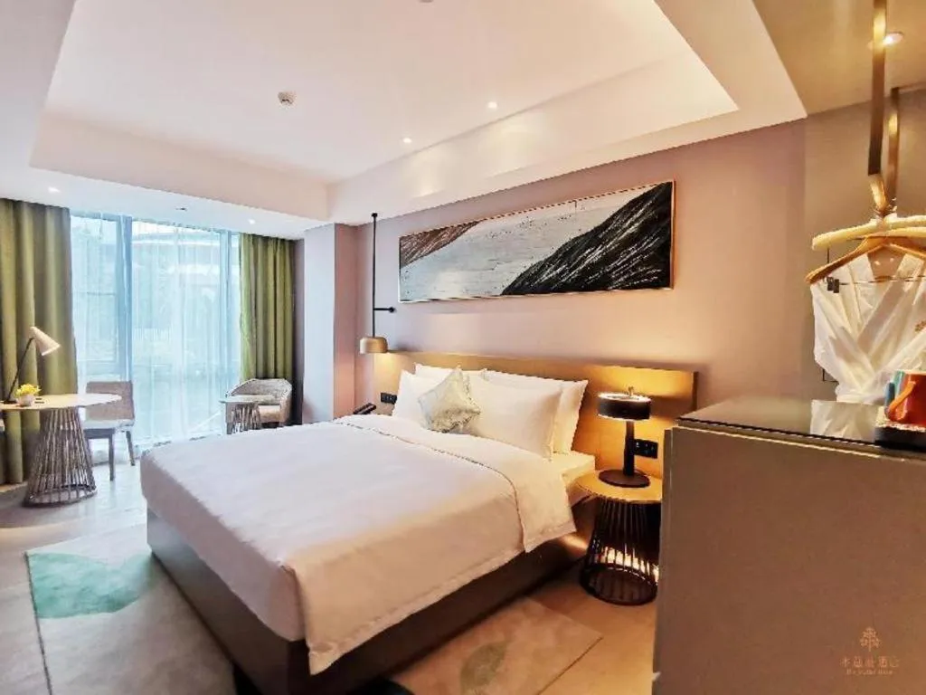 Bed in Kecheng Holiday Hotel