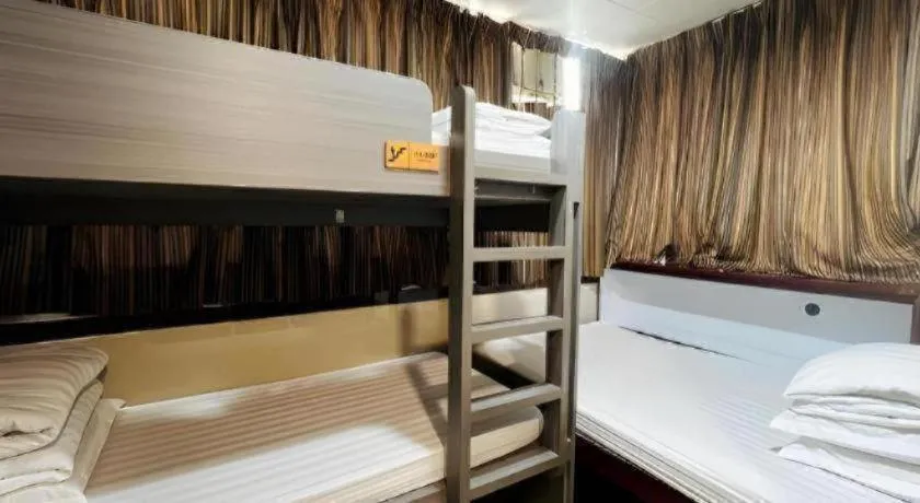 Bed in New Mong Kok Guest House