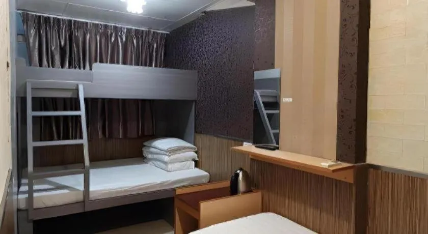 Bed in New Mong Kok Guest House