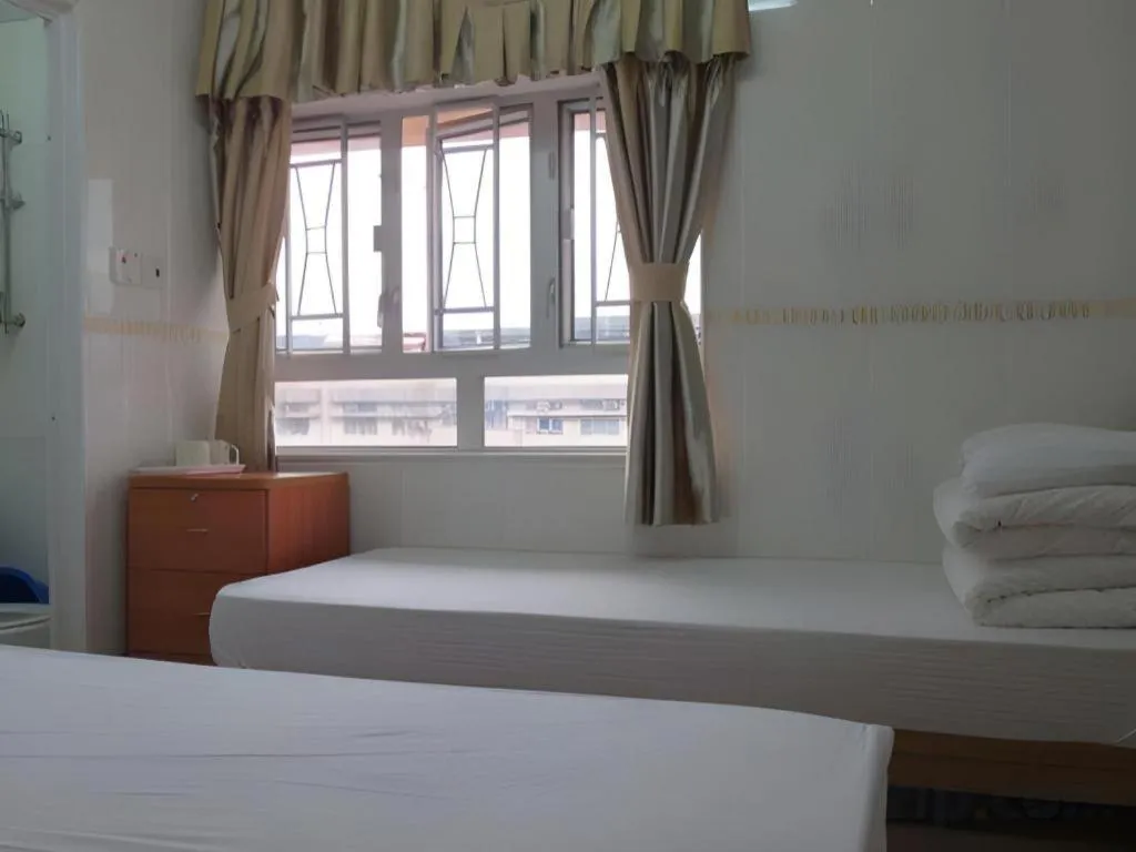 Bed in New Mong Kok Guest House