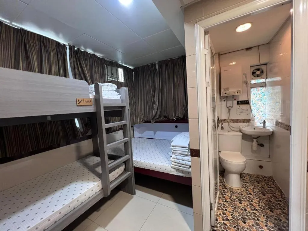 Bed in New Mong Kok Guest House