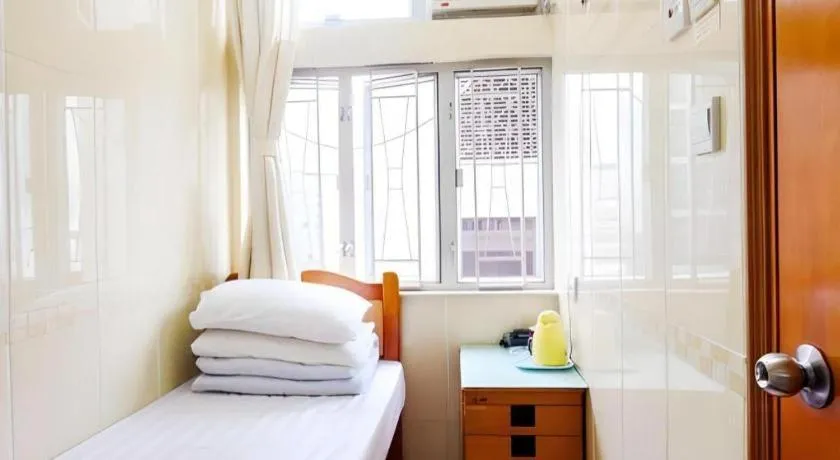 Bed in New Mong Kok Guest House