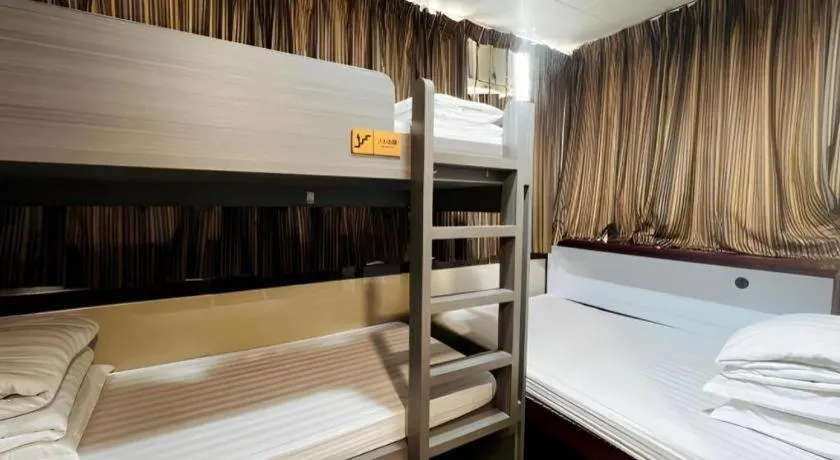 Bed in New Mong Kok Guest House