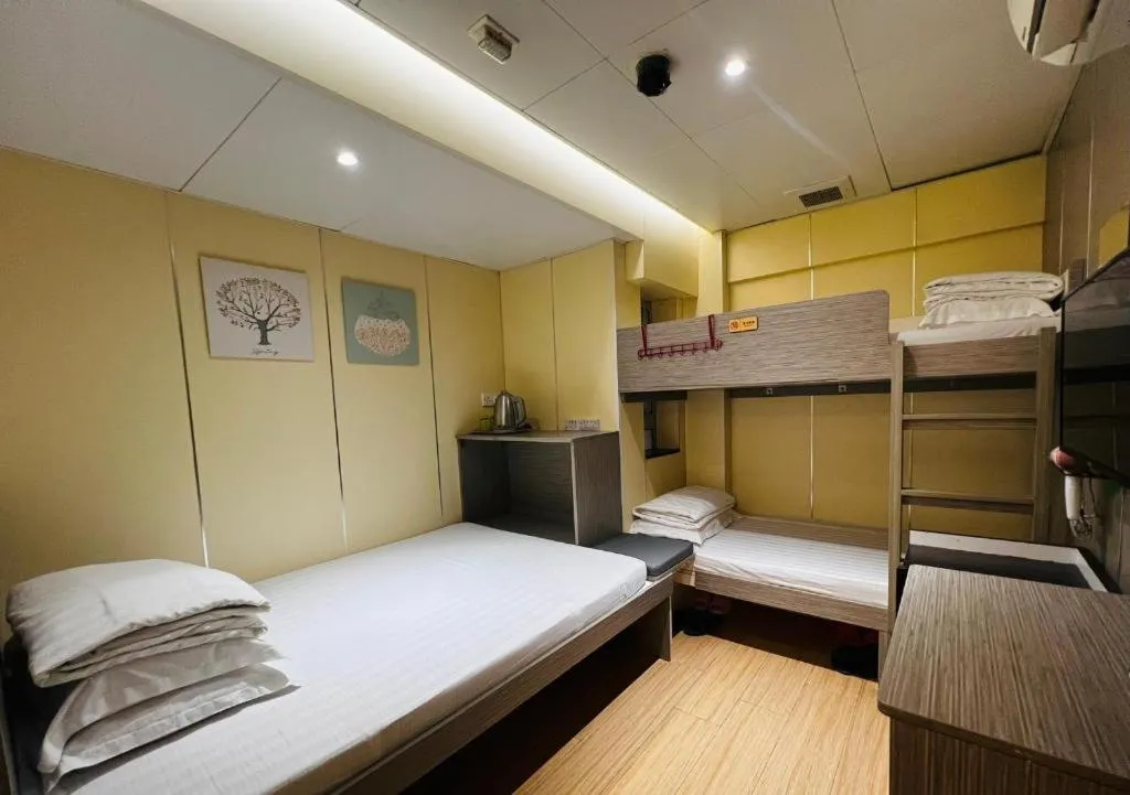 Bed in New Mong Kok Guest House