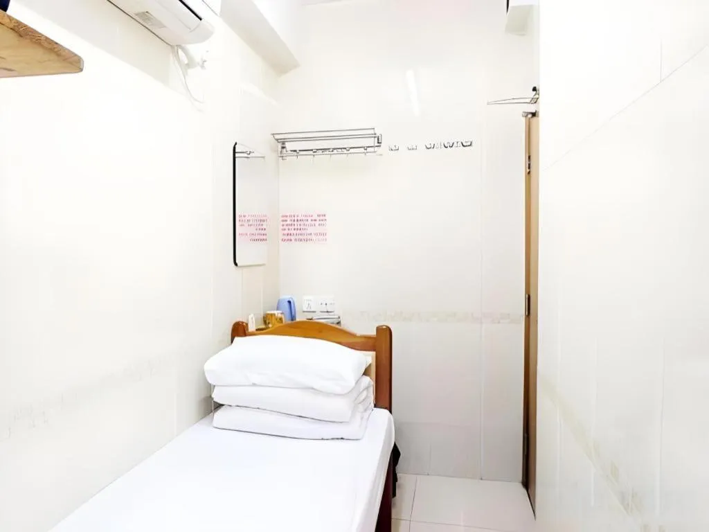 Bed in New Mong Kok Guest House