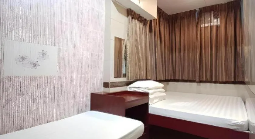 Bed in New Mong Kok Guest House