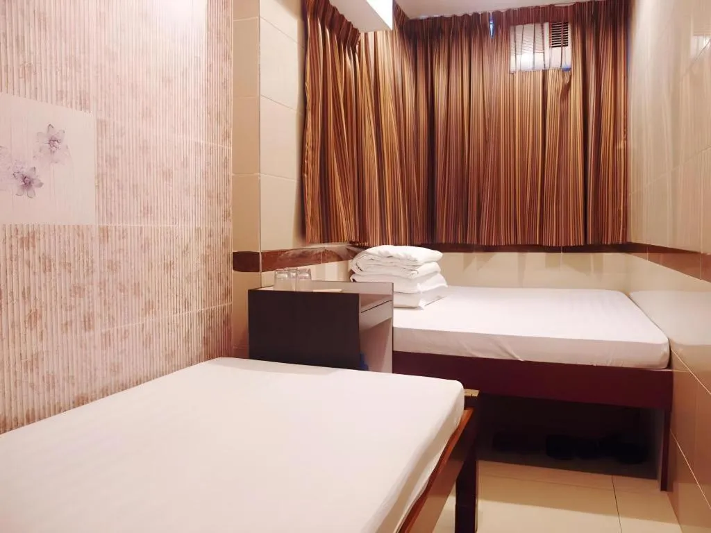 Bed in New Mong Kok Guest House