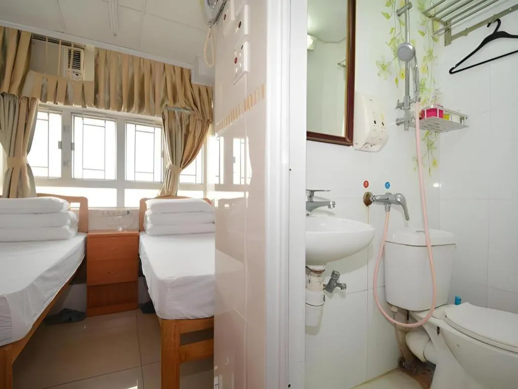 Bed in New Mong Kok Guest House