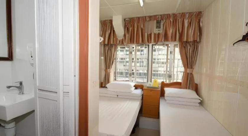 Bed in New Mong Kok Guest House
