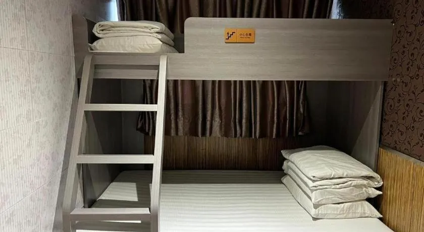 Bed in New Mong Kok Guest House