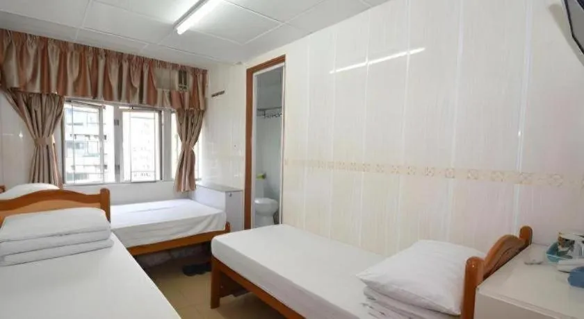 Bed in New Mong Kok Guest House