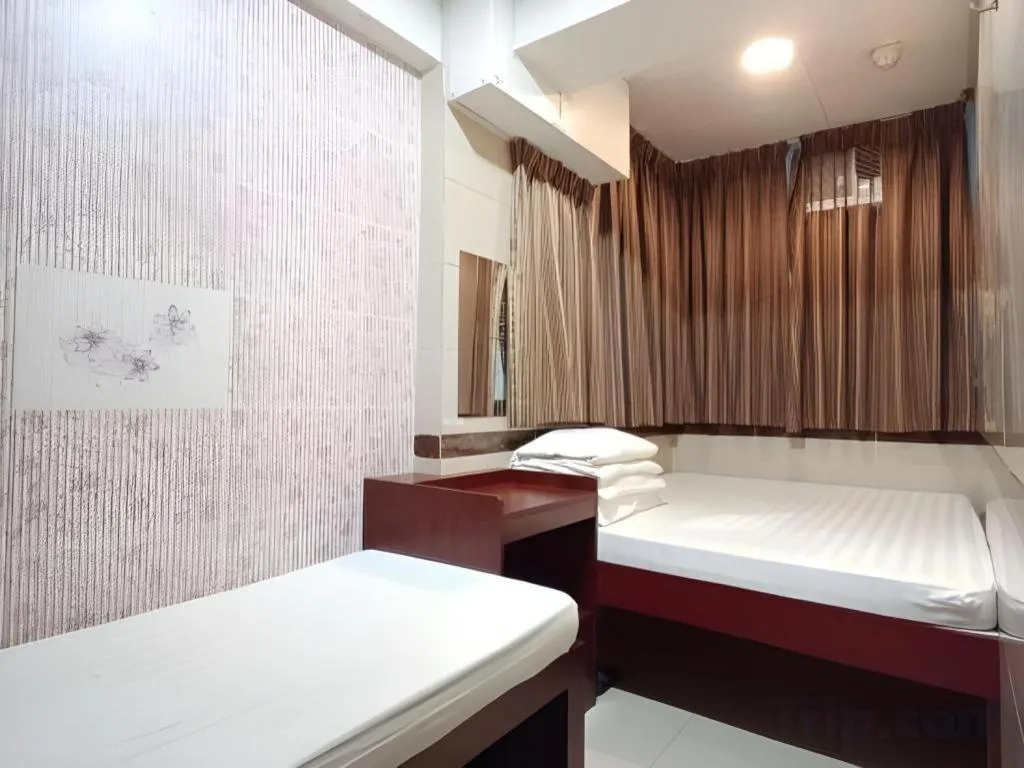 Bed in New Mong Kok Guest House