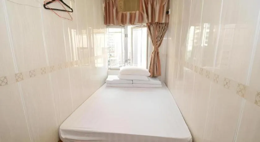 Bed in New Mong Kok Guest House