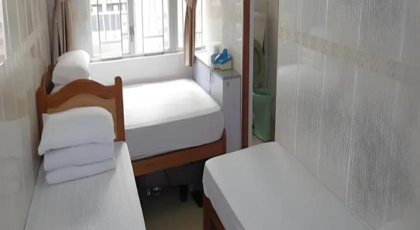 Bed in New Mong Kok Guest House