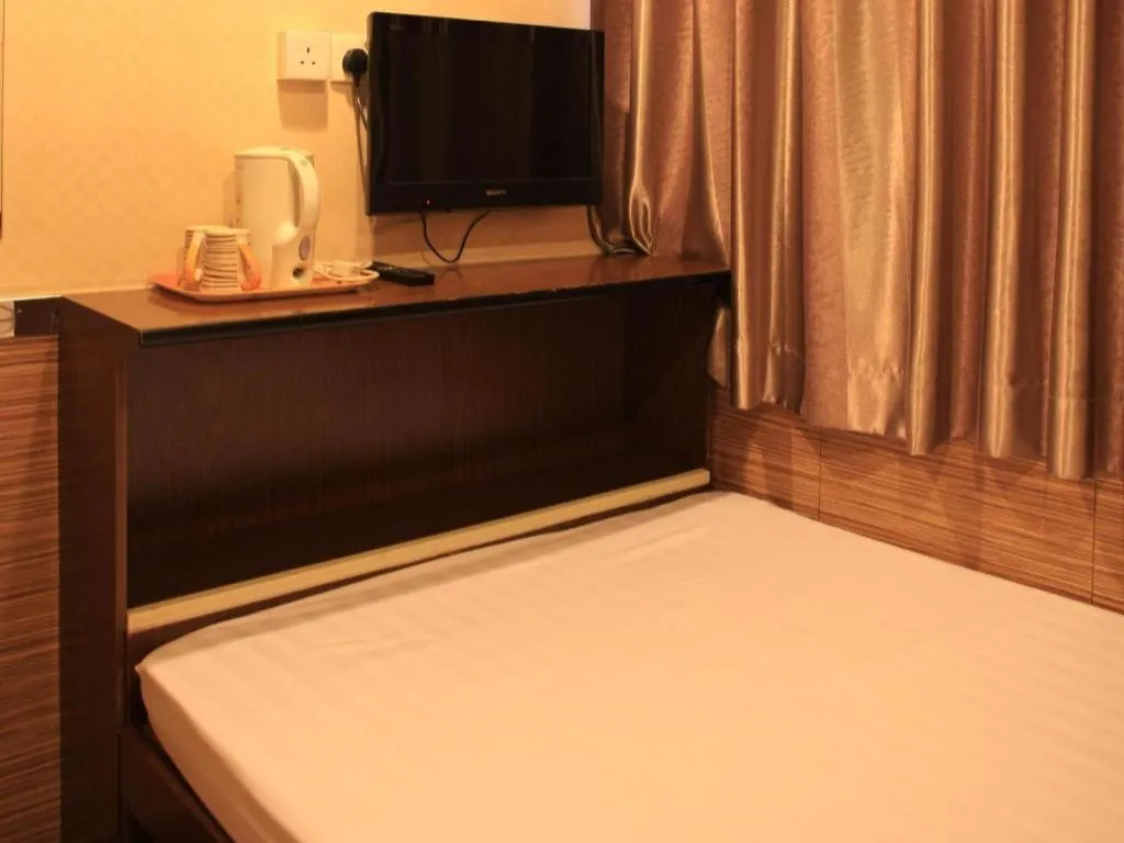 Bed in New Mong Kok Guest House