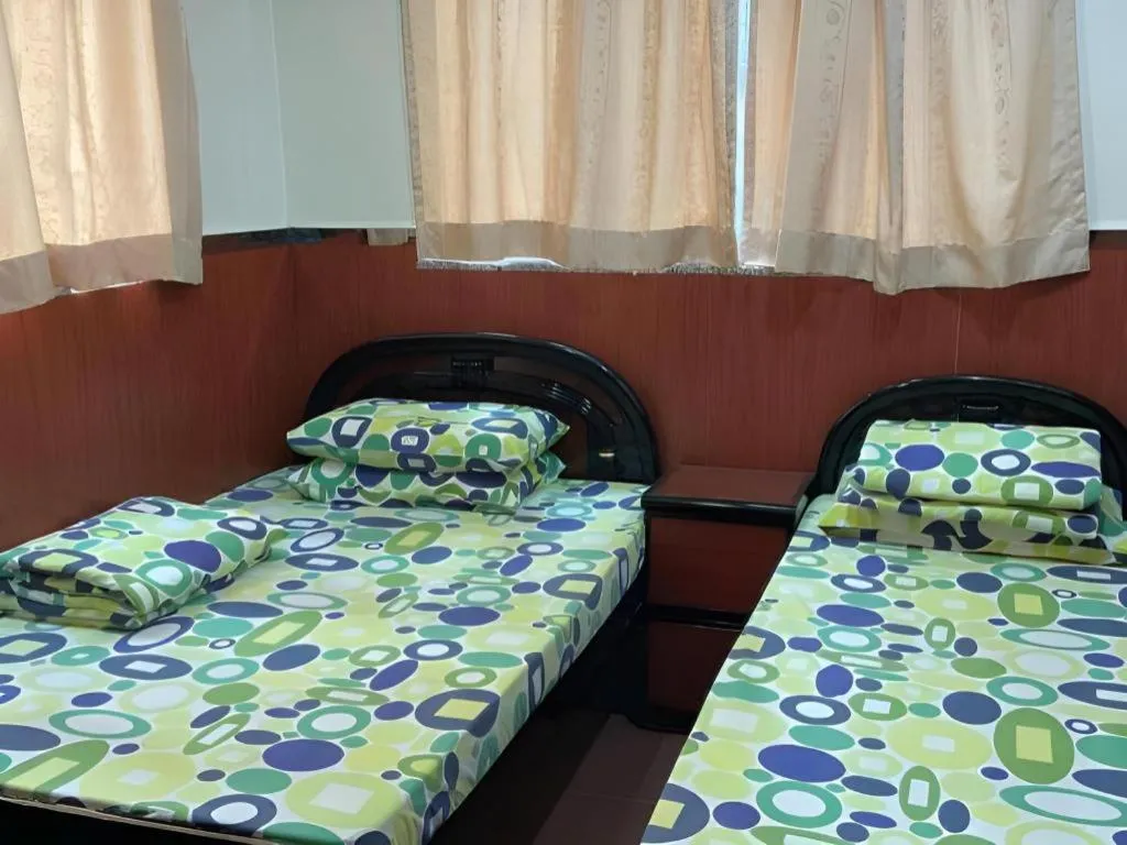 Bed in New Mong Kok Guest House