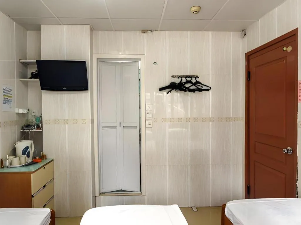 Bed in New Mong Kok Guest House