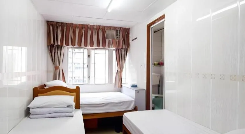 Bed in New Mong Kok Guest House