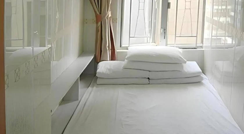 Bed in New Mong Kok Guest House