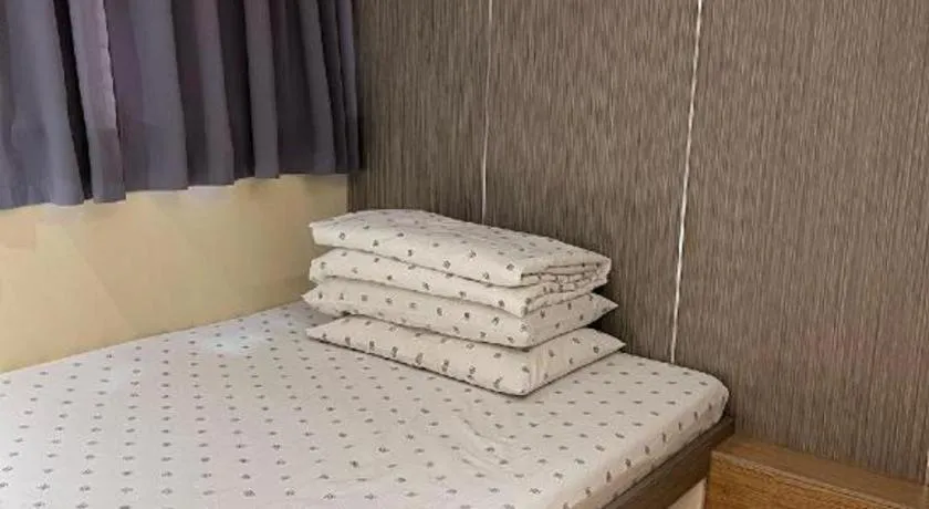 Bed in New Mong Kok Guest House