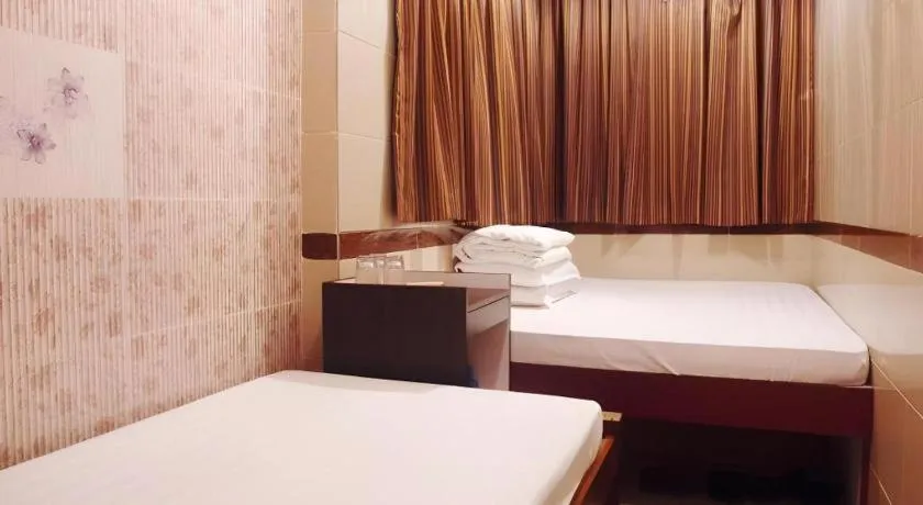 Bed in New Mong Kok Guest House