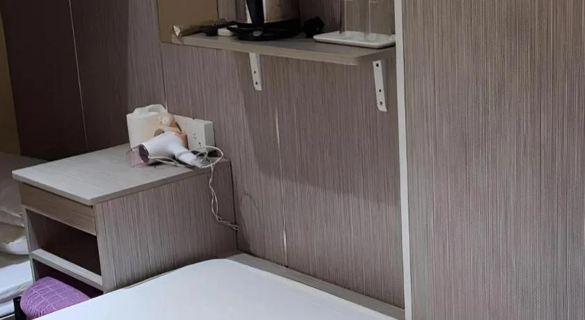 Bed in New Mong Kok Guest House