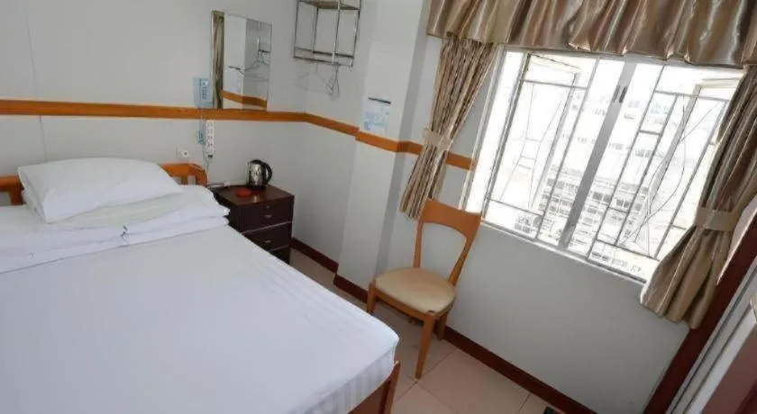 Bed in New Mong Kok Guest House