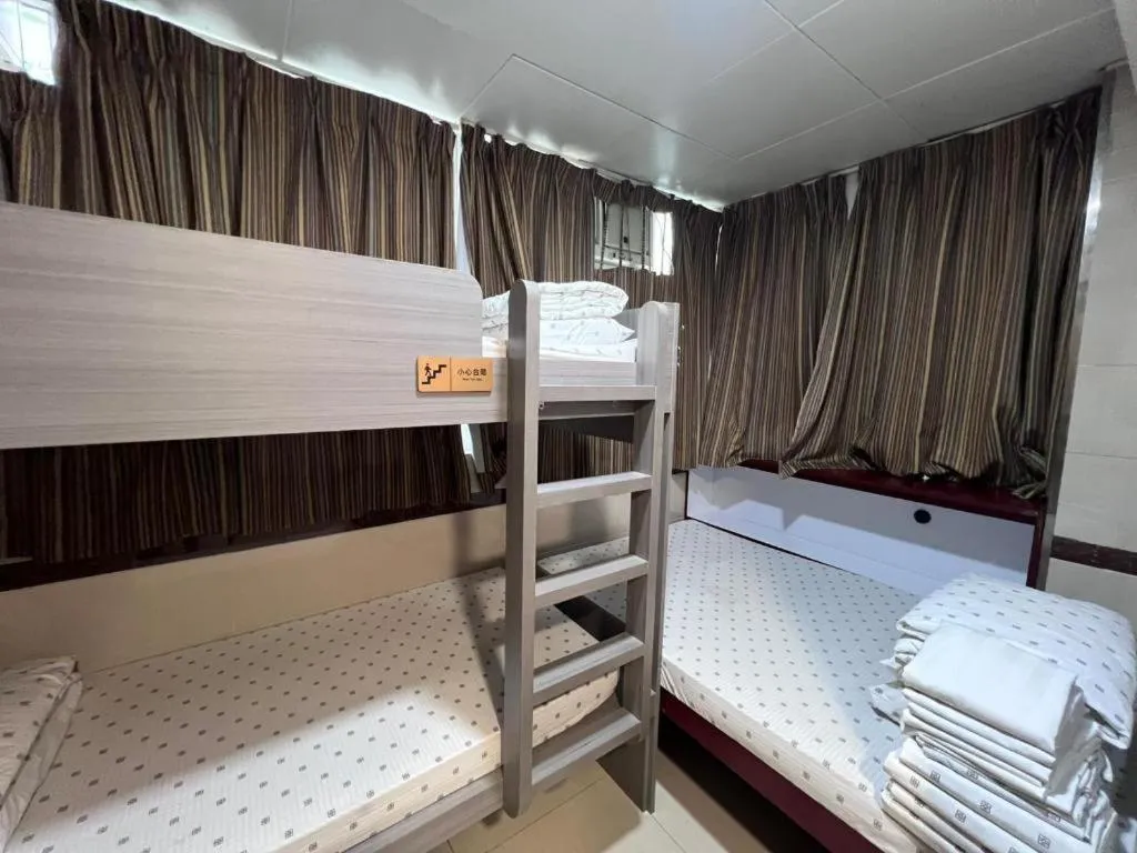 Bed in New Mong Kok Guest House