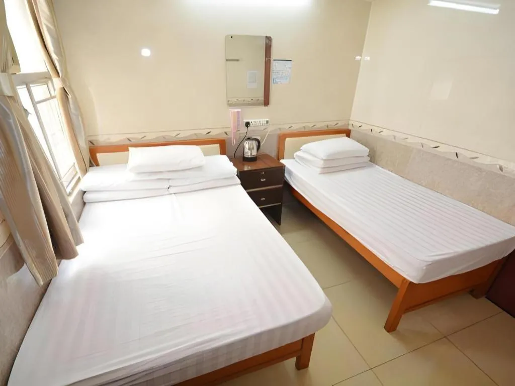 Bed in New Mong Kok Guest House