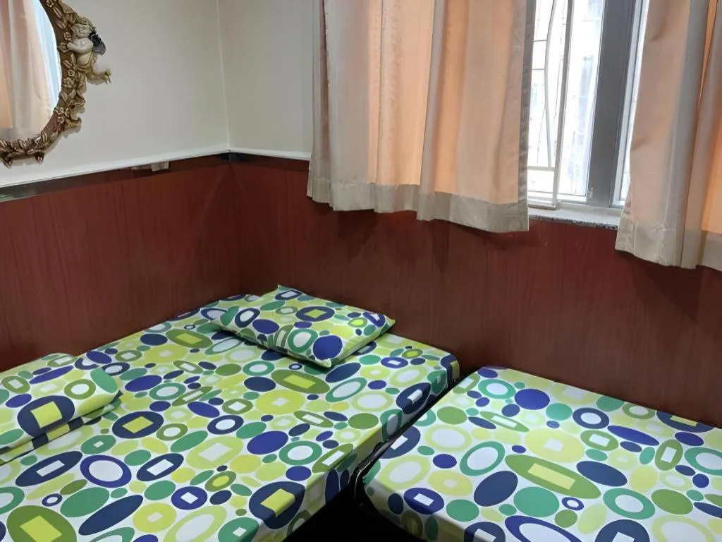 Bed in New Mong Kok Guest House