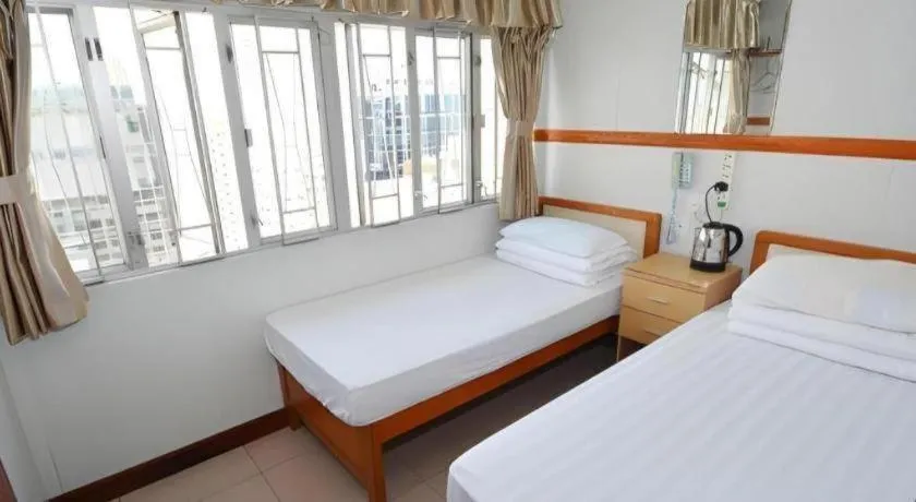 Bed in New Mong Kok Guest House