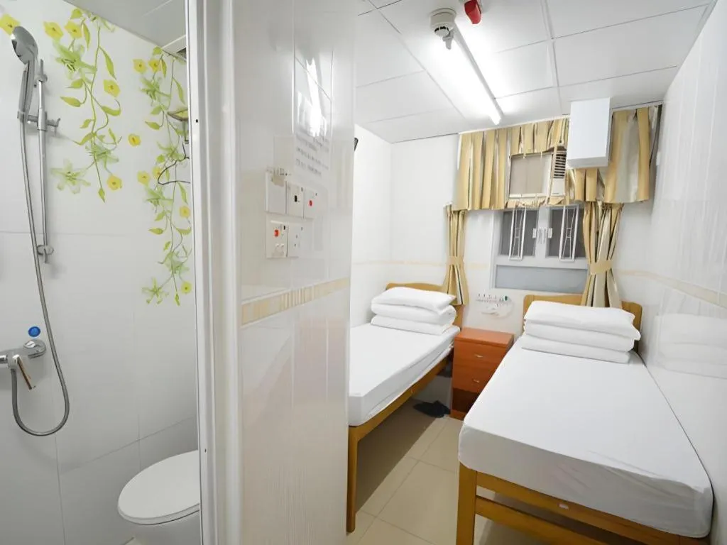 Bed in New Mong Kok Guest House