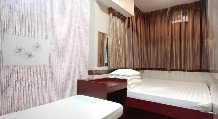 Bed in New Mong Kok Guest House