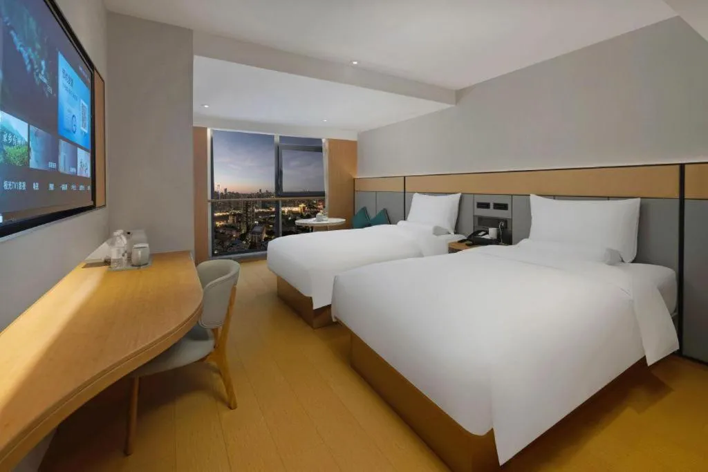 Bed in JI Hotel Chongqing Shangqing Temple