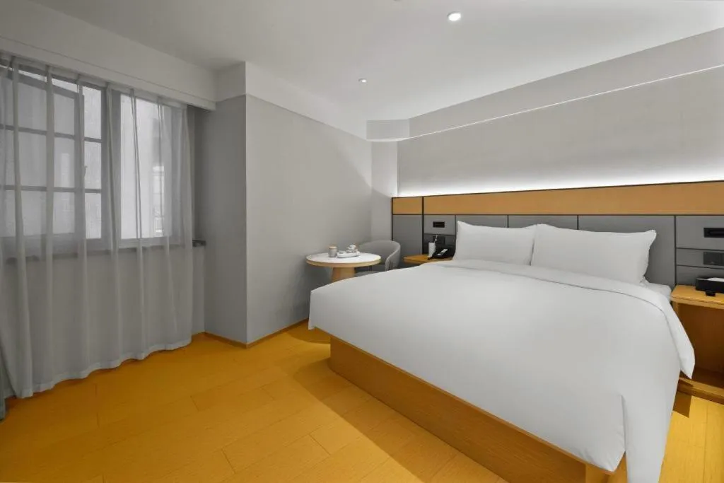 Bed in JI Hotel Chongqing Shangqing Temple