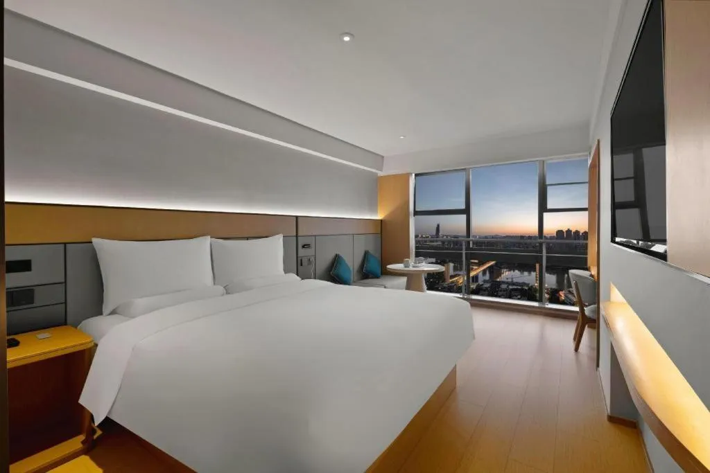 Bed in JI Hotel Chongqing Shangqing Temple